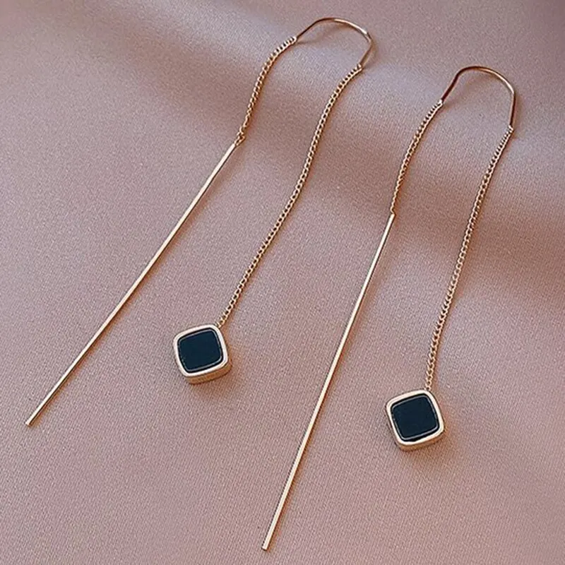 Elegant Black Dangling Gold Earrings