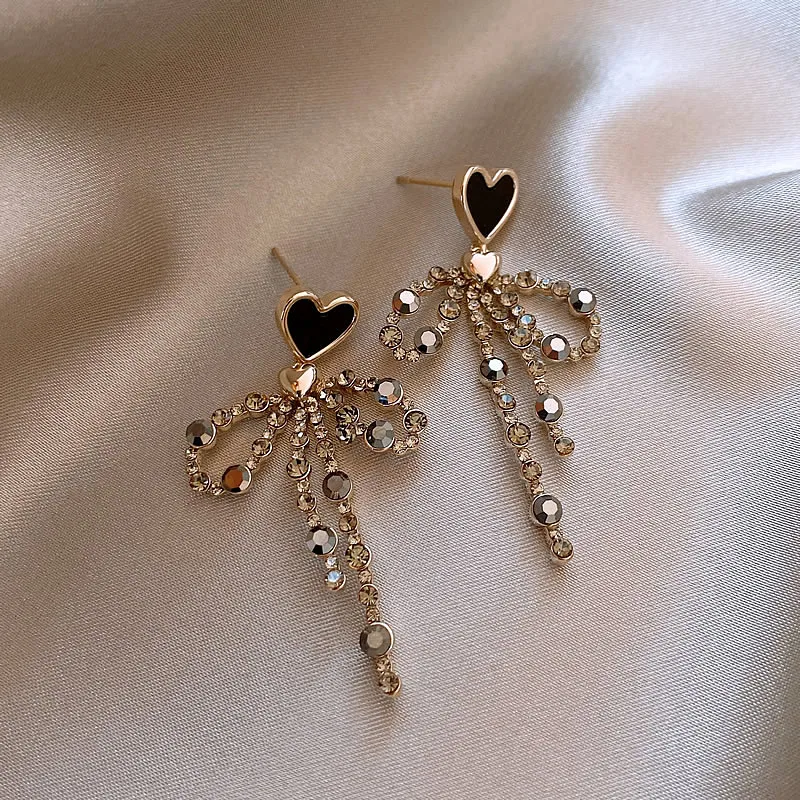 Elegant Zirconia Dangling Bow Heart Earrings